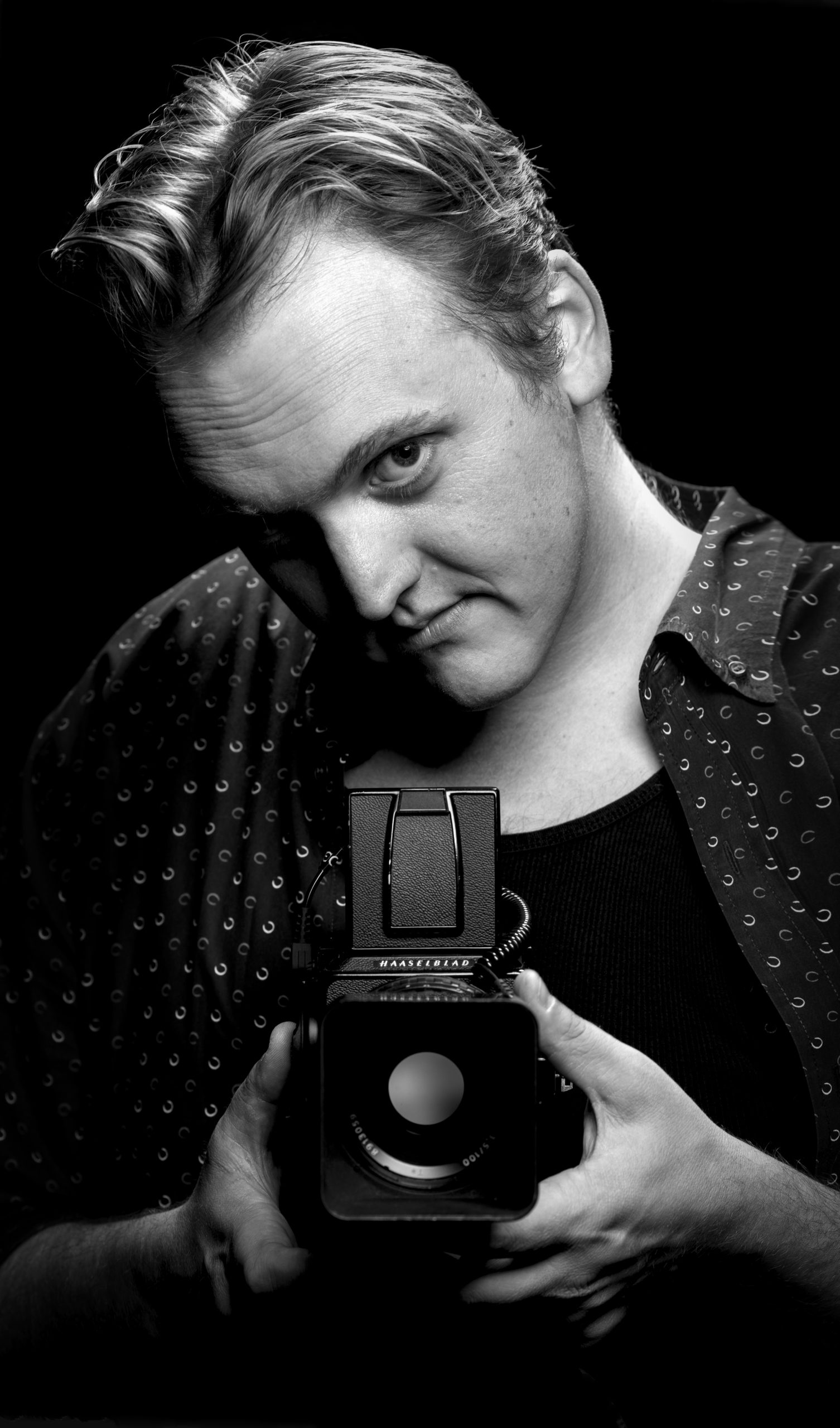 Hasselblad camera held by Haas Weston